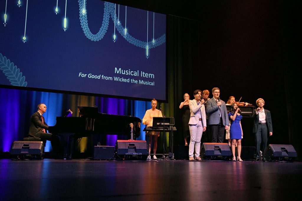 Year 12 Ensemble with Andrew Barrett performing at Her Majesty's Theatre