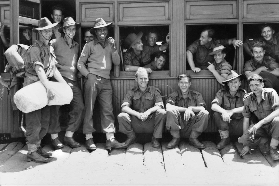 Gunditjmara man Reg Saunders surrounded by his mates of the 27th Battalion, in 1943